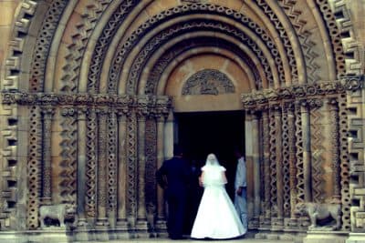 A couple enters a church in Budapest, Hungary before their wedding. (Fabio Penna / Flickr)