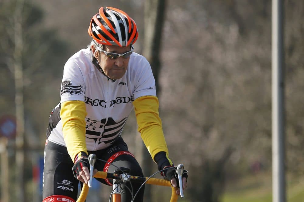 Secretary of State John Kerry, seen here biking in March, fractured his right femur Sunday. (Brian Snyder/AP)