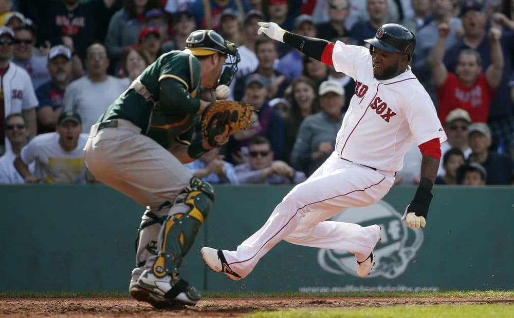 Boston Red Sox's David Ortiz scores on a single by Mike Napoli. (Michael Dwyer/AP)