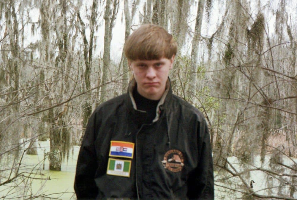 Dylann Roof made this his Facebook profile photo on May 21, 2015. His jacket shows two apartheid-era flags: South Africa (top) and Rhodesia (as Zimbabwe was called during a period of white rule). (Facebook)