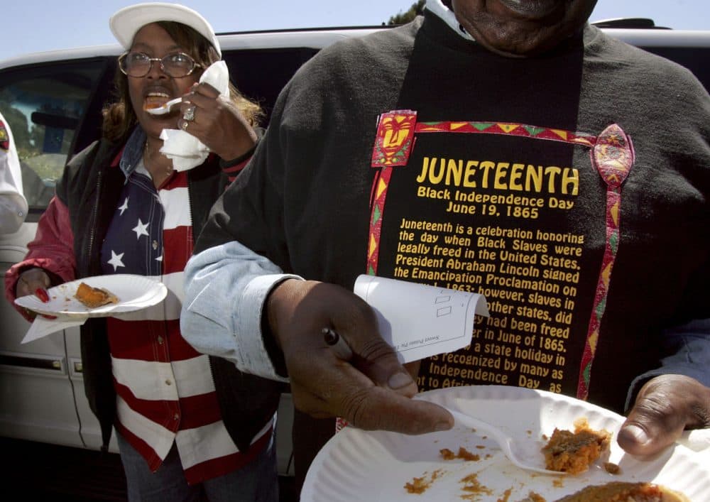 Naomi Williams (left) and D'Emanuel Grosse Sr. (right) taste the sweet potato pie entered in the cook-off contest at the Juneteenth, Black Independence Day celebrations at Nichol Park on June 19, 2004 in Richmond, California. The holiday is celebrated in June because slaves in Texas and several other states did not learn of their freedom until June of 1865. (David Paul Morris/Getty Images)