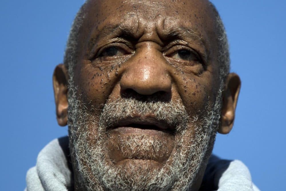 In this Nov. 2014 file photo, comedian Bill Cosby speaks in Philadelphia. A federal judge will hear arguments on Cosby's request to have dismissed a defamation lawsuit filed by three women accusing him of decades-old sex crimes. (Matt Rourke/AP)