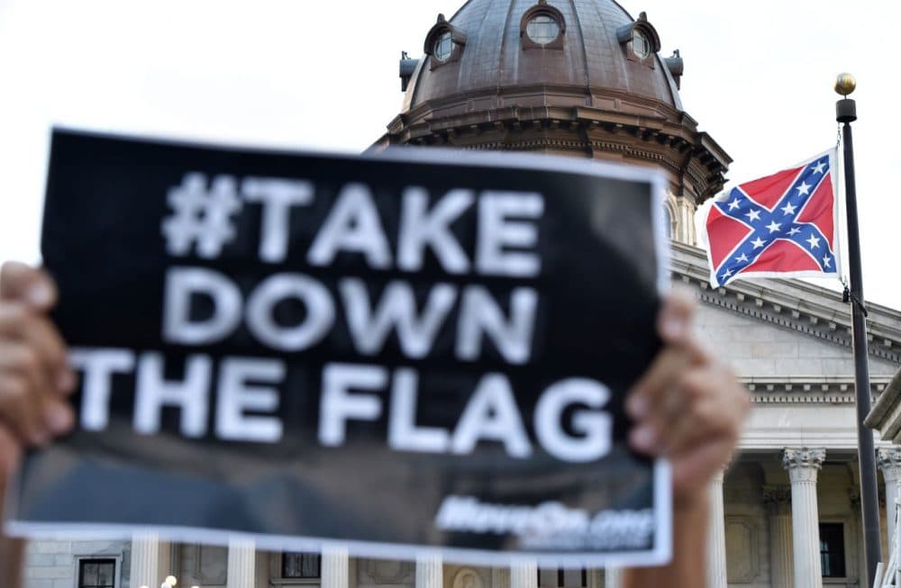 Hundreds of people protest against the Confederate flag during a protest rally in Columbia, South, Carolina on June 20, 2015. (Mladen Antonov/Getty Images)