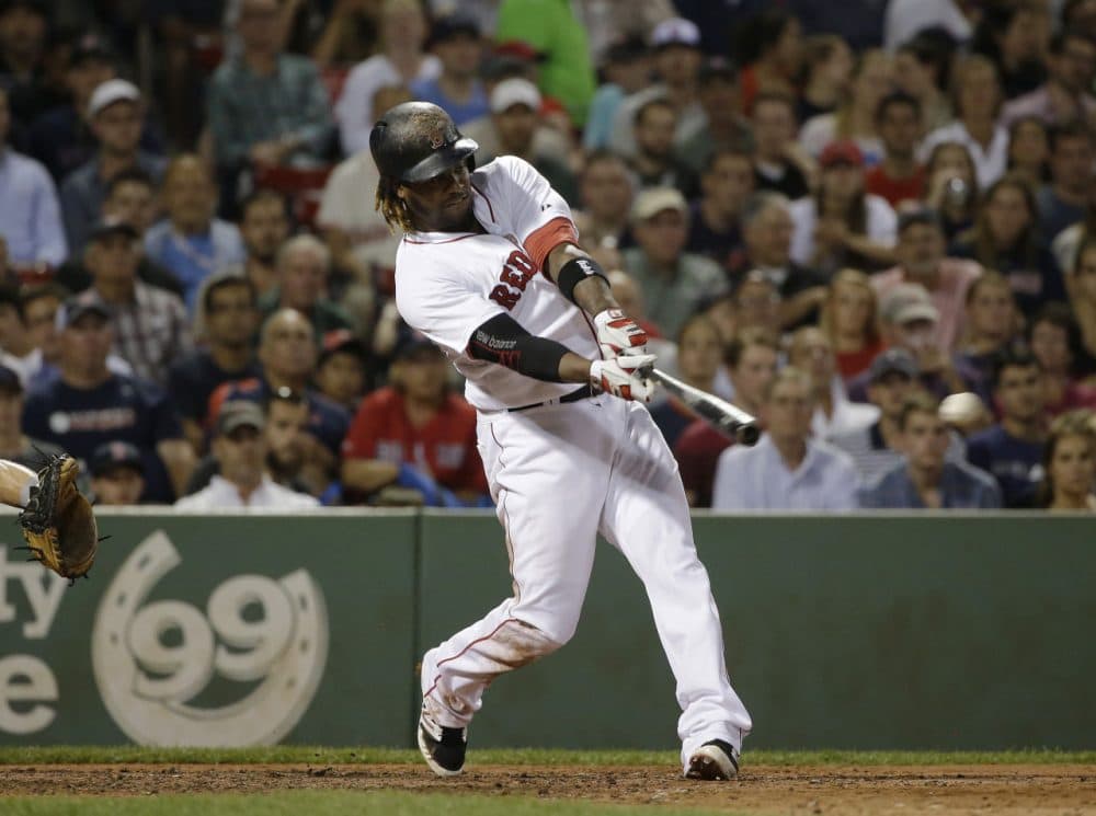 Boston Red Sox's Hanley Ramirez hits an RBI single in the fifth inning of a game at Fenway, Tuesday, June 23, 2015. (Steven Senne/AP)