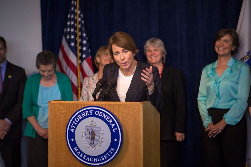 State Attorney General Maura Healey, who is gay, lauds the Supreme Court's decision to make same-sex marriage legal in all 50 states, at a news conference at her Boston office Friday. Former AG Martha Coakley is behind Healey's right shoulder. (Jesse Costa/WBUR)