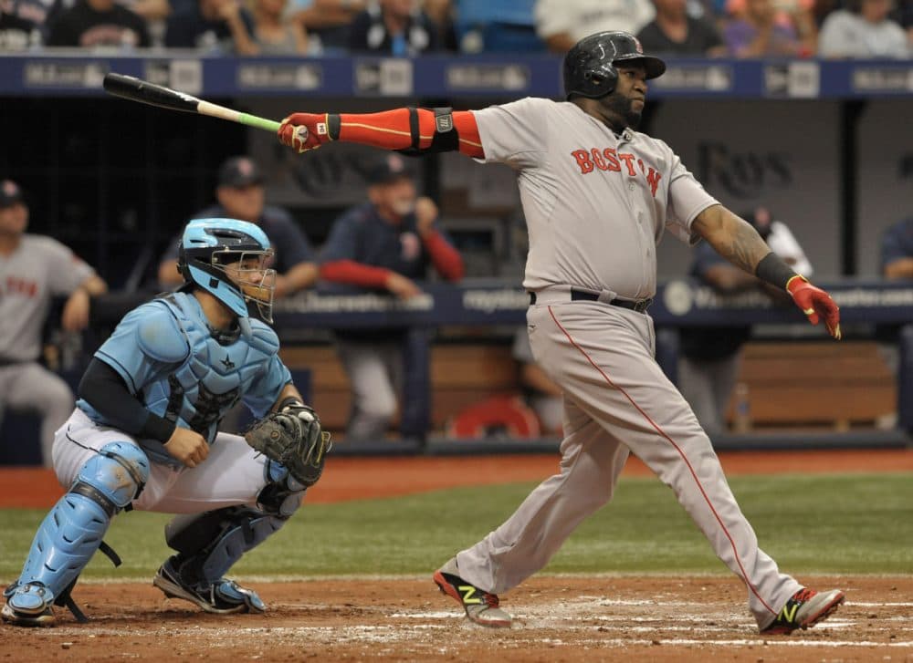David Ortiz hits a two-run home run during the fourth inning on Sunday. (Steve Nesius/AP)