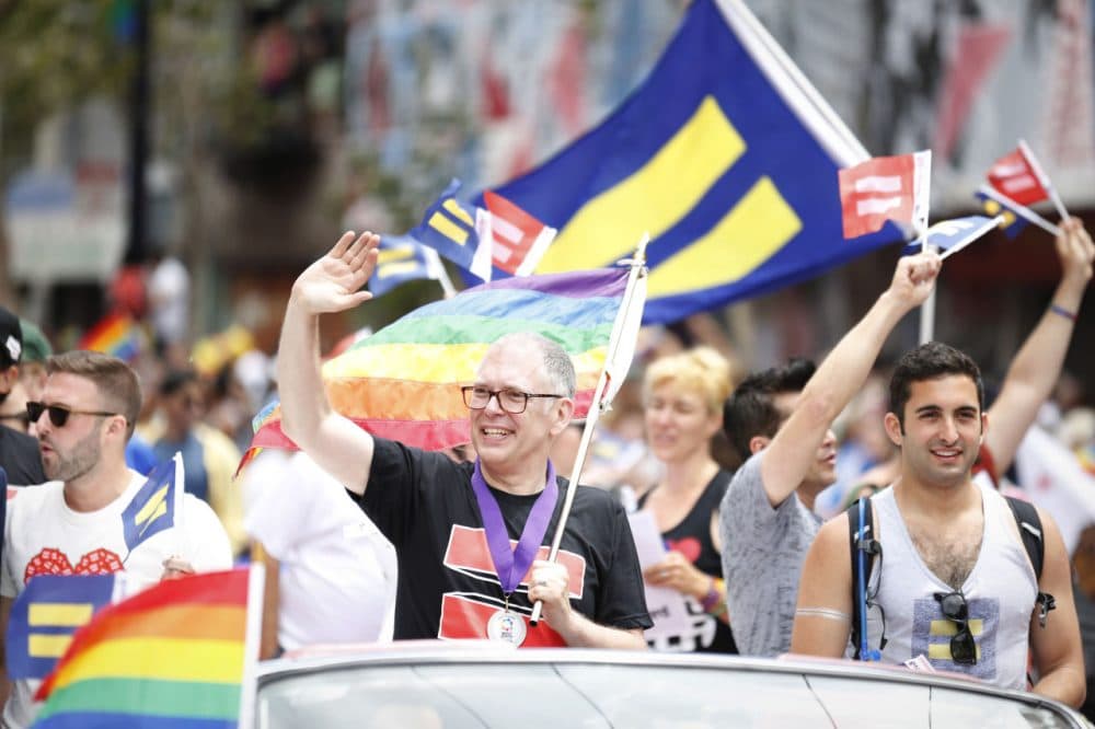 Jim Obergefell rides in the San Francisco Pride Parade on Sunday, two days after the Supreme Court's landmark decision to require that states issue marriage licenses to same sex couples. (AP Images for Human Rights Campaign)