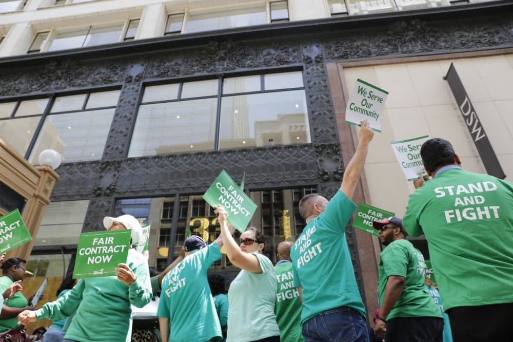 In this June 9, 2015 photo, members of the American Federation of State, County and Municipal Employees (AFSCME) protest in Chicago. More than 40,000 state workers’ contracts are set to expire at the end of the month, but no agreement is in sight between the various labor unions representing them. (Christian K. Lee/AP)