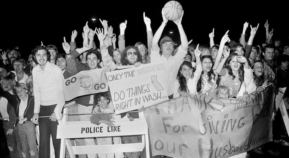 Steve Almond: &quot;It makes watching games a lot of fun. It’s something we can share. But I also worry that I’ve made a grave mistake.&quot; Pictured: More than 3,000 fans were on hand to greet the Golden State Warriors as they returned to San Francisco, May 26, 1975, after handing the Washington Bullets a 96-95 loss to take four straight games and the NBA championship title. Forty years later, the Warriors are back in the Finals, this time against the Cleveland Cavaliers. (RB/AP)