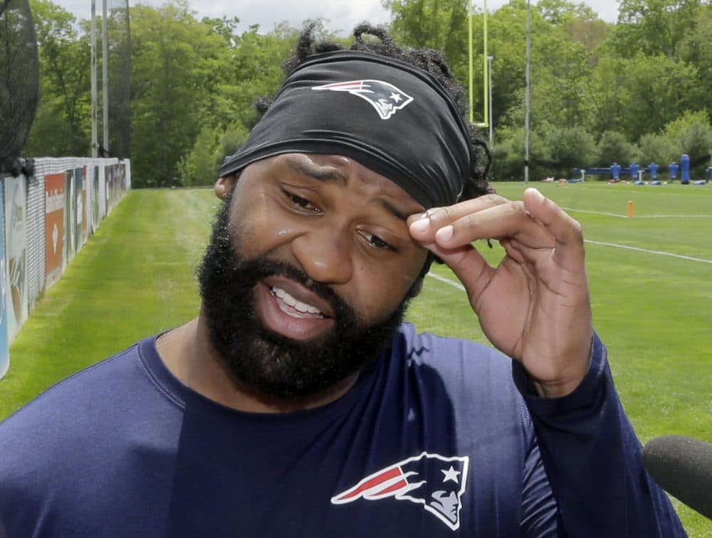 Brandon Spikes talks with reporters in Foxborough in May. (Elise Amendola/AP)