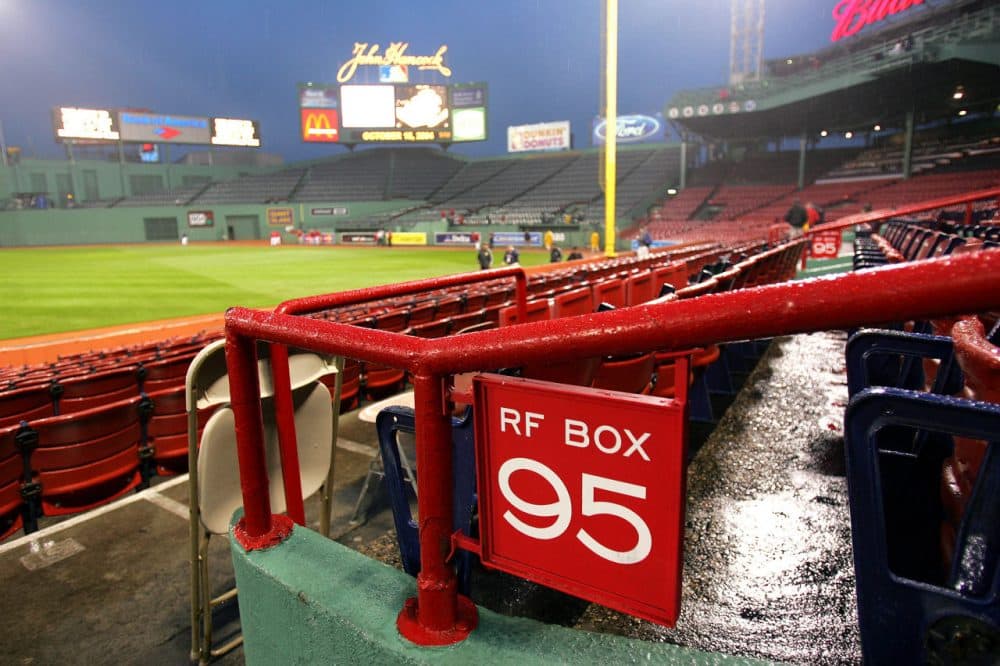The Boston Red Sox season has been dismal, which prompted Bill Littlefield to remember another time when he picked dinner over watching the Sox at Fenway. (Jed Jacobsohn/Getty Images)