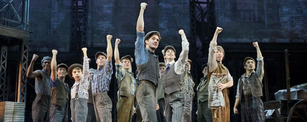 Dan DeLuca (center) and the ensemble of Disney's &quot;Newsies,&quot; which at times almost suggests a “Les Misérables” for the American urchin set.  (Deen van Meer/Disney)
