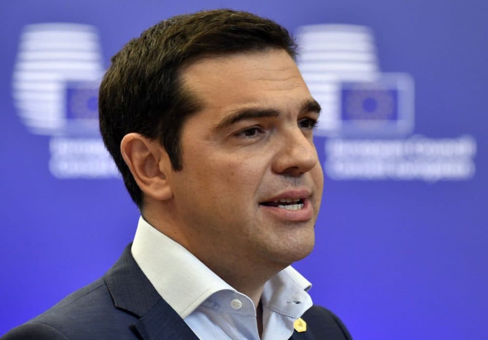 Greek Prime Minister Alexis Tsipras answers journalists' questions after an EU summit at the EU headquarters in Brussels on June 26, 2015. The German chancellor urged Greece to accept an 'extraordinarily generous' offer from its EU-IMF creditors, which includes at least 12 billion euros ($13.4 billion) in further rescue cash over the next five months. (John Thys/AFP/Getty Images)