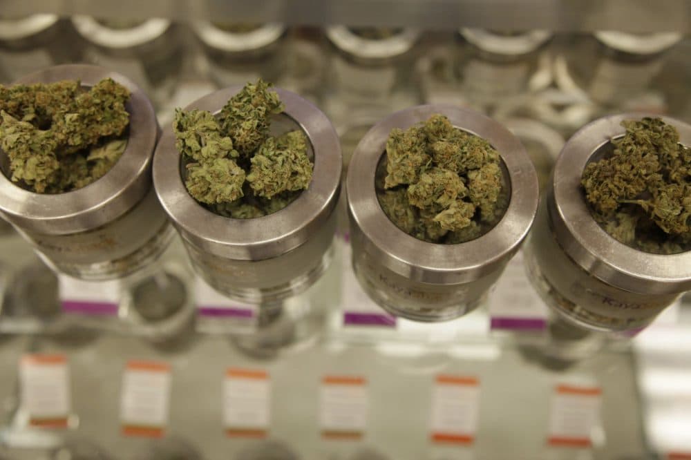 Different varieties of marijuana flowers are displayed at medical marijuana dispensary Kaya Shack in Portland, Ore. On July 1, recreational marijuana in Oregon became legal, but it's likely customers won't be able to buy the pot at medical dispensaries until October 1. (Gosia Wozniacka/AP)