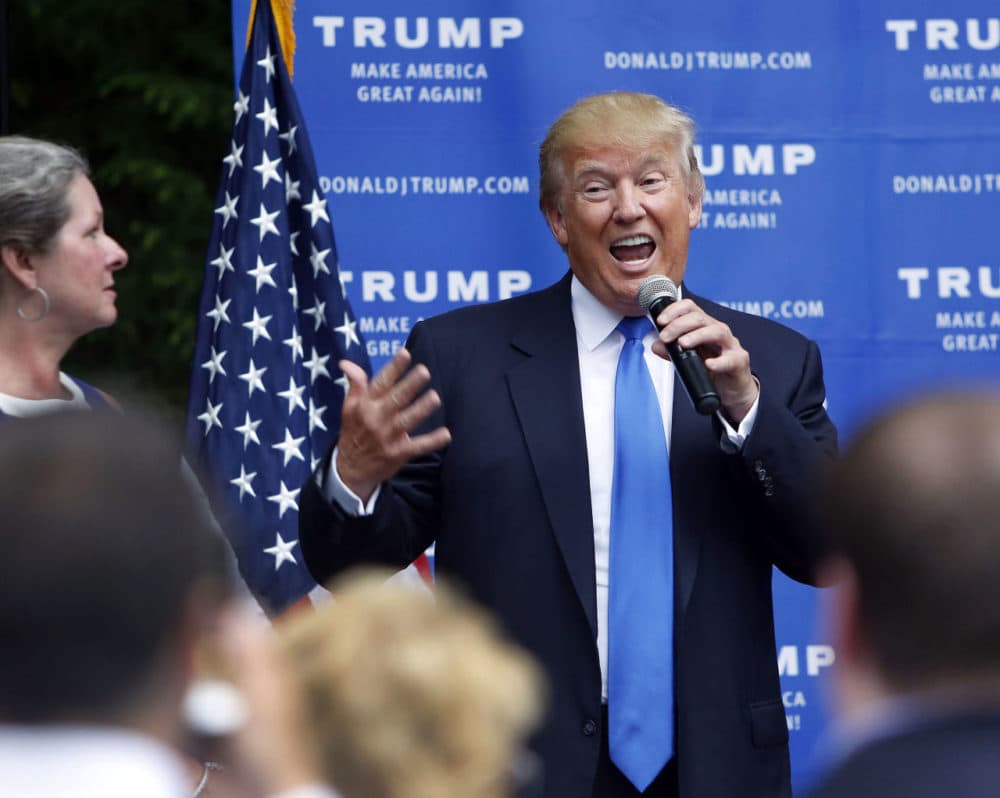 Republican presidential candidate Donald Trump speaks at a house party Tuesday in Bedford, N.H. (Jim Cole/AP)