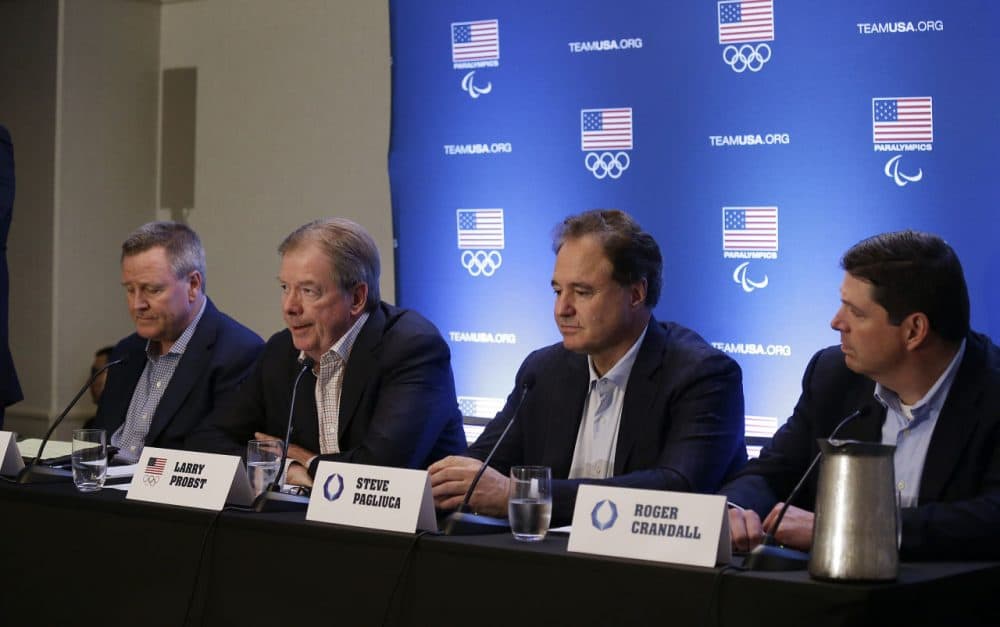 From left: United States Olympic Committee CEO Scott Blackmun, USOC Chair Larry Probst, Boston 2024 Chair Steve Pagliuca and Boston 2024 Vice Chair Roger Crandall speak during a news conference Tuesday in Redwood City, Calif. (Eric Risberg/AP)