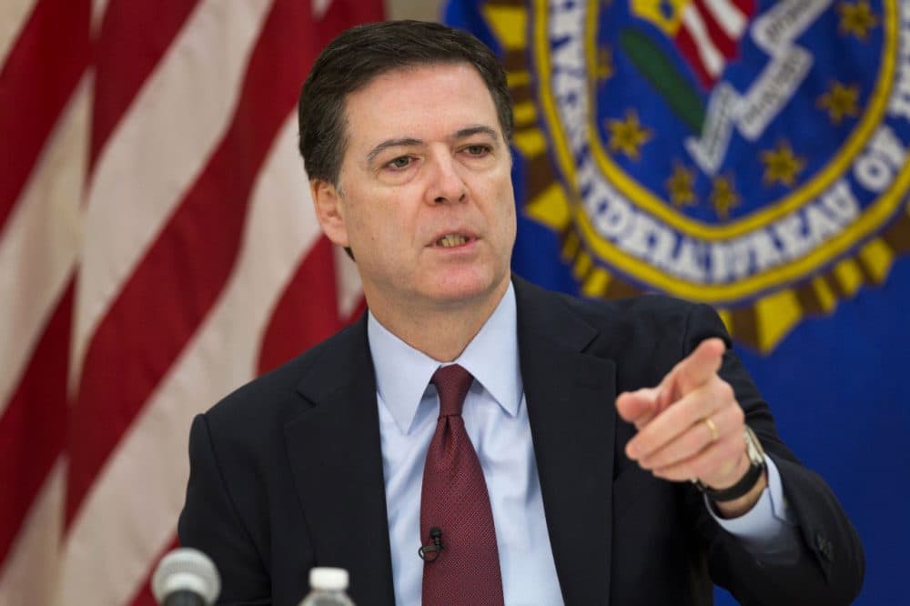 FBI director James Comey gestures during a news conference at FBI headquarters in Washington, Wednesday, March 25, 2015. (Evan Vucci/AP)