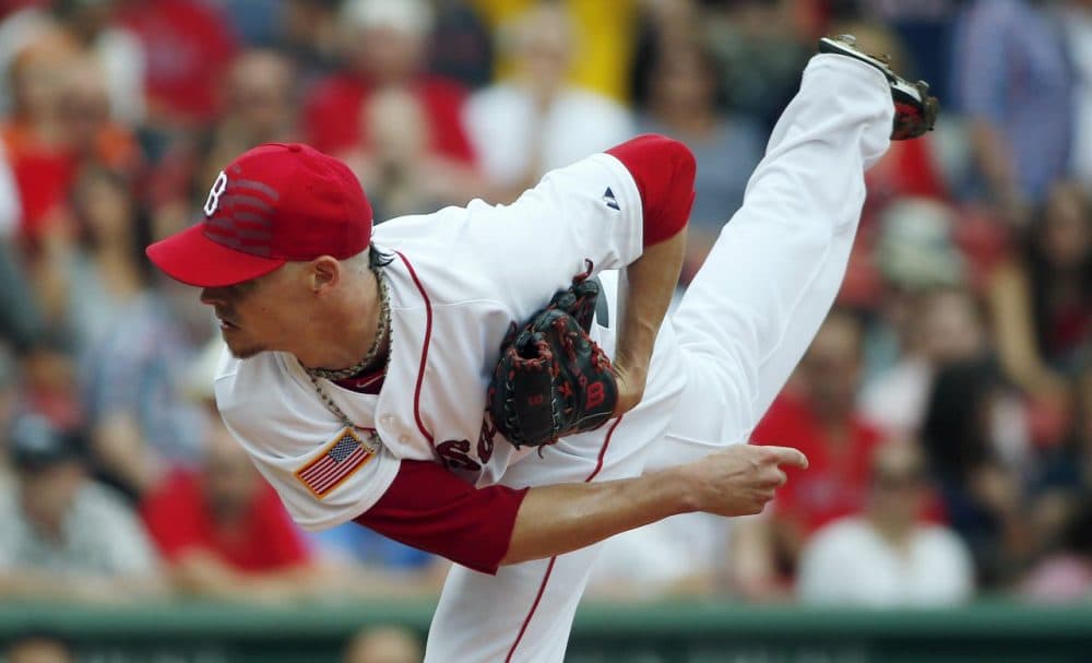 Boston Red Sox's Clay Buchholz pitches during the first inning in the Fourth of July game against the Astros. (Michael Dwyer/AP)
