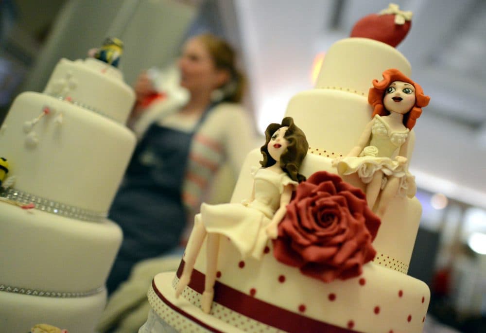 A same-sex wedding cake is pictured at the Gay Wedding Show at the Queens Hotel on March 2, 2014 in Leeds, England. (Nigel Roddis/Getty Images)