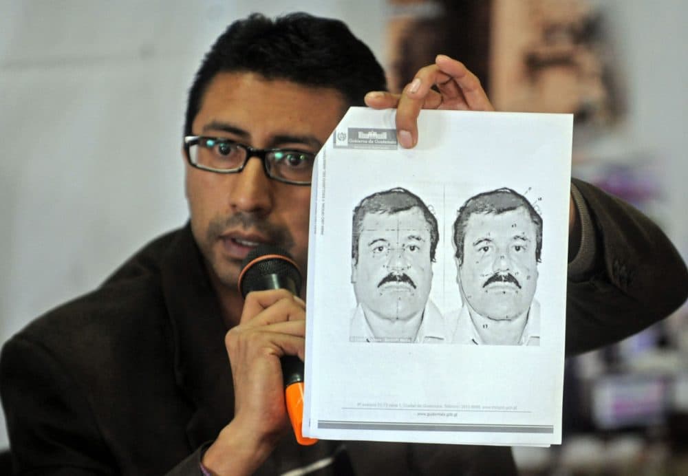 Guatemalan migration director Carlos Pac shows a picture of Mexican drug trafficker Joaquin &quot;El Chapo&quot; Guzman Loera during a press conference in Guatemala City on July 12, 2015. The security authorities of Guatemala are in alert after the escape of the leader of the powerful Sinaloa cartel, reported Sunday an official source. AFP PHOTO / Johan ORDONEZ        (Photo credit should read JOHAN ORDONEZ/AFP/Getty Images)