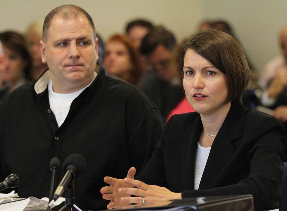 Joseph Donovan, 38, who was sentenced to life in prison for felony murder for his participation in a 1992 robbery of a Massachusetts Institute of Technology student who died of stab wounds, listens as his attorney Ingrid Martin speaks at a hearing before the state's parole board. (The Boston Globe, Wendy Maeda, Pool/AP)