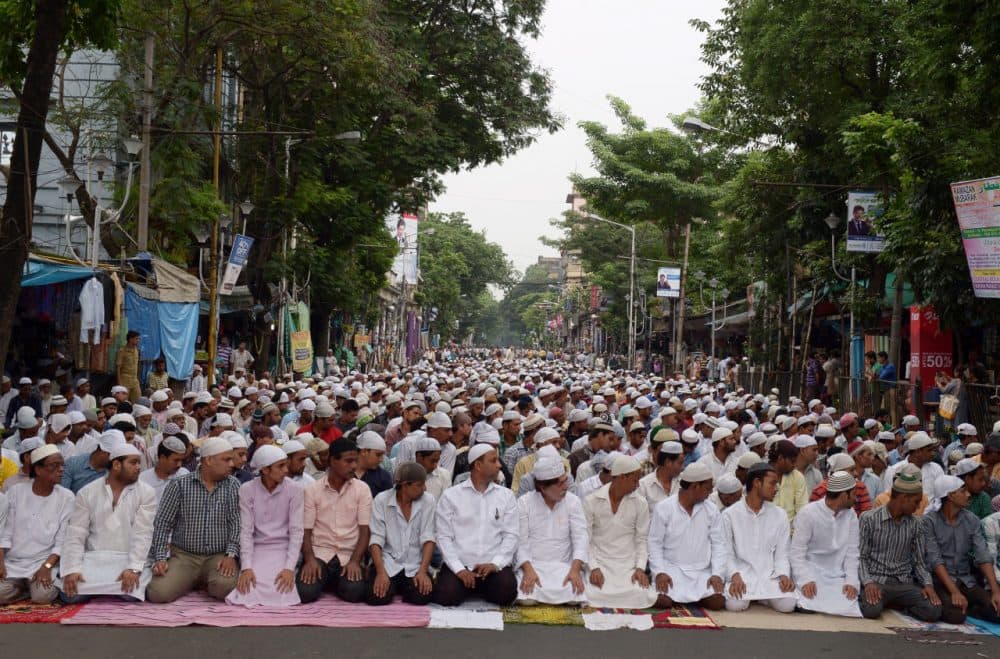 Indian Muslims attend the last Friday prayers of the holy month of Ramadan, in Kolkata on July 17, 2015. (Dibyangshu Sarkar/AFP/Getty Images)