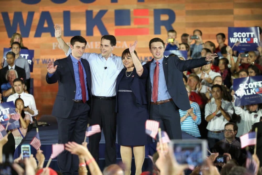 Wisconsin Governor Scott Walker stands on stage with his wife Tonette and sons Alex (L) and Matt afer announcing that he will seek the Republican nomination for president on July 13, 2015 in Waukesha, Wisconsin. (Scott Olson/Getty Images)