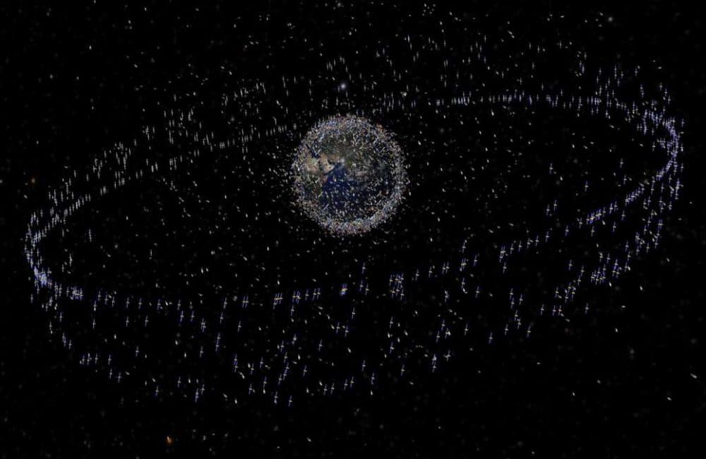 The number of objects in Earth's orbit is increasing steadily. The debris objects shown in this image are an artist's impression based on actual density data. However, the debris objects are shown at an exaggerated size to make them visible at the scale shown. (Image by the European Space Agency via NASA)