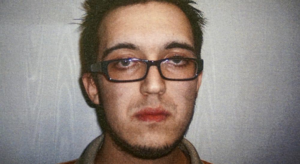 This April 14, 2014 booking photo shows Alexander Ciccolo, after being charged with drunken driving. Authorities said Ciccolo, the son of a Boston police captain, was arrested July 4, 2015 in Adams, Mass., and is accused of plotting to detonate pressure-cooker bombs at an unidentified university and to broadcast the killings of students live online to show his support for the Islamic State group. (Northern Berkshire District Court/AP)
