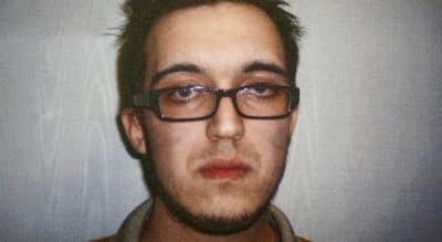 This April 14, 2014 booking photo shows Alexander Ciccolo, after being charged with drunken driving. Authorities said Ciccolo, the son of a Boston police captain, was arrested July 4, 2015 in Adams, Mass., and is accused of plotting to detonate pressure-cooker bombs at an unidentified university and to broadcast the killings of students live online to show his support for the Islamic State group. (Northern Berkshire District Court/AP)