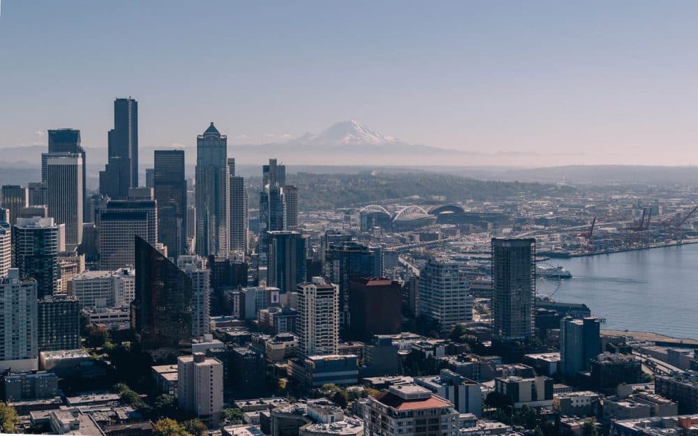 Seattle is 54 miles northwest of Mount Rainier, the highest mountain in the Cascade Range. It rises along the fault line called the Cascadia subduction zone. (saltyfoto/Flickr)