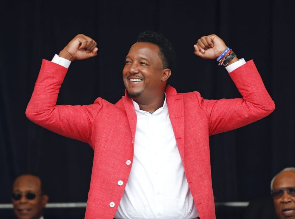 National Baseball Hall of Fame electee Pedro Martinez reacts to cheering fans during an awards ceremony at Doubleday Field on Saturday, July 25, 2015, in Cooperstown, N.Y. (Mike Groll/AP)