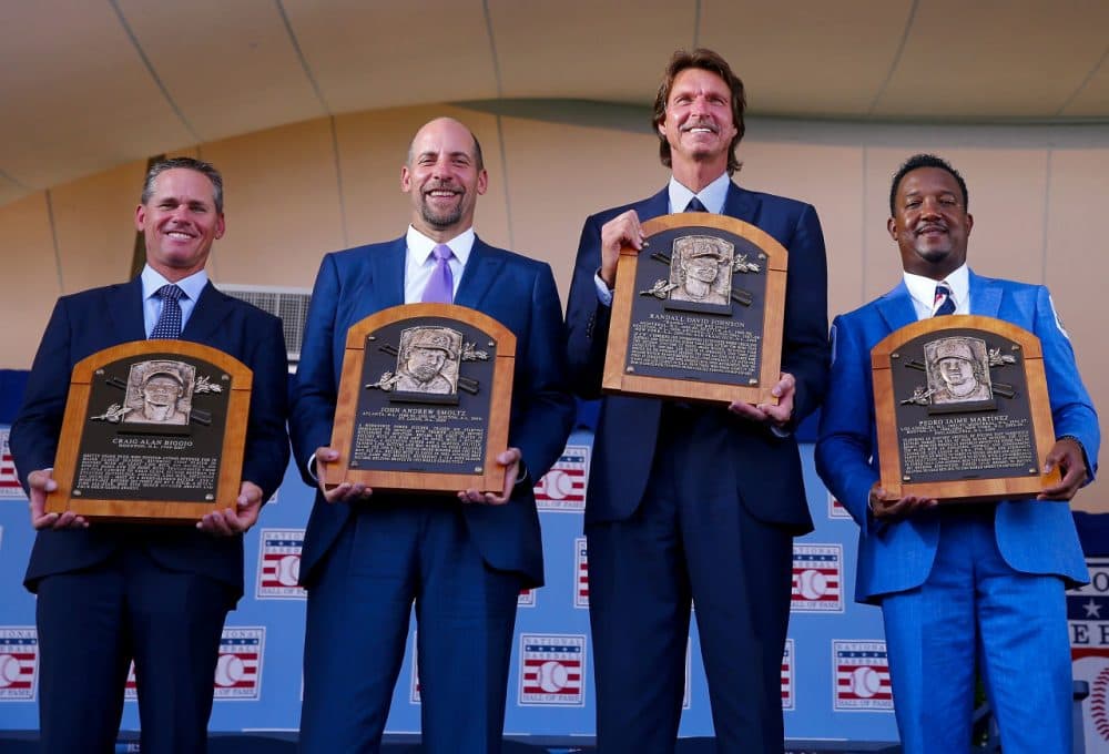 2015 Inductees Craig Biggio,John Smoltz,Randy Johnson and Pedro Martinez pose with their plaques after the Induction Ceremony at National Baseball Hall of Fame on July 26, 2015 in Cooperstown, New York. (Elsa/Getty Images)