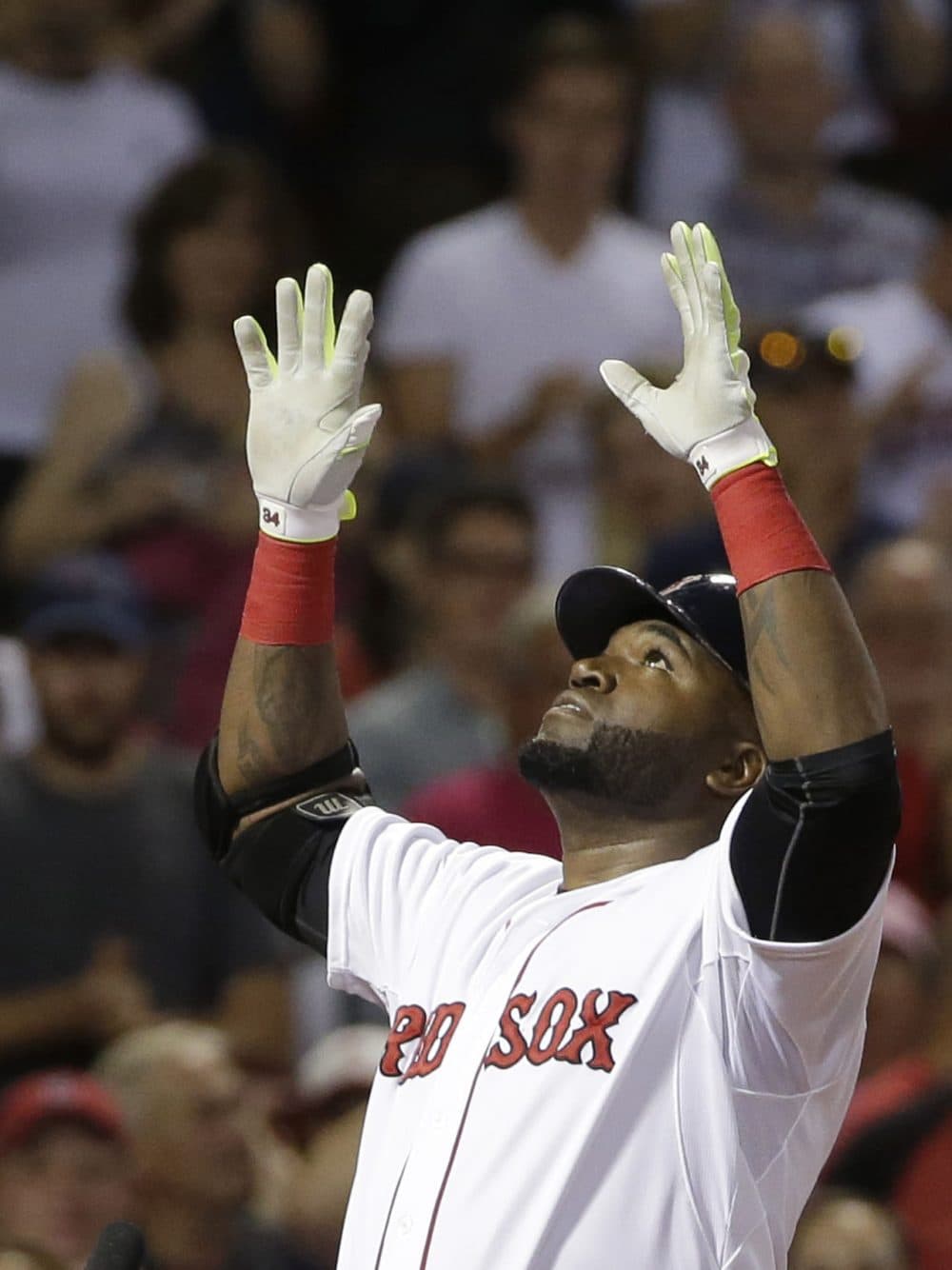 David Ortiz celebrates a three-run home run as he arrives at home plate in the seventh inning of a game against the Tigers at Fenway, Sunday, July 26, 2015. It was the second three-run home run of the evening for Ortiz. (Steven Senne/AP)
