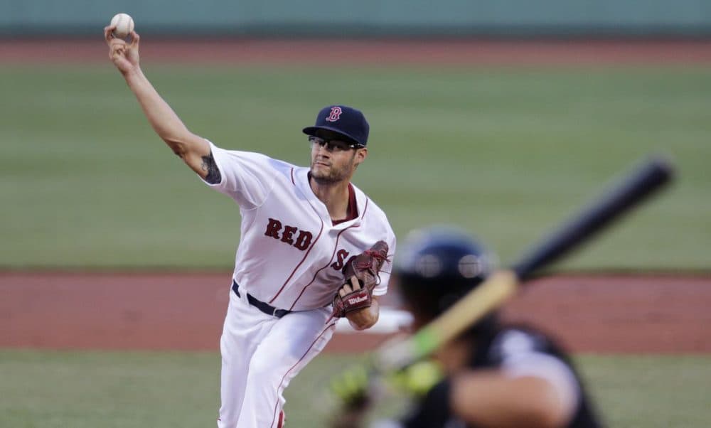 Red Sox starting pitcher Joe Kelly delivers to the White Sox during a game at Fenway, Monday, July 27, 2015. (Charles Krupa/AP)