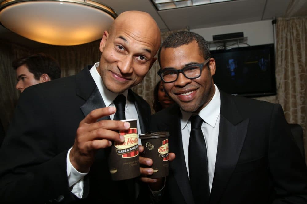 Actors Keegan-Michael Key, left, and Jordan Peele in Backstage Creations Suites at the 66th Primetime Emmy Awards at the Nokia Theatre L.A. Live on Monday, Aug. 25, 2014, in Los Angeles. (Omar Vega/Invision for Backstage Creations/AP)