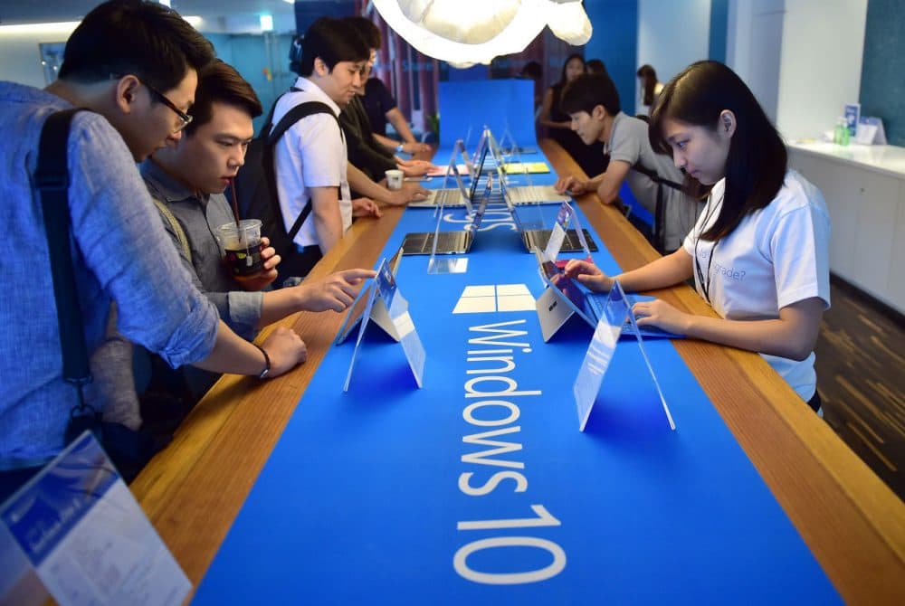 Visitors try out Windows 10, the latest operating system from US software giant Microsoft, during a launch event in Seoul on July 29, 2015. ( Jung Yeon-Je/AFP/Getty Images)