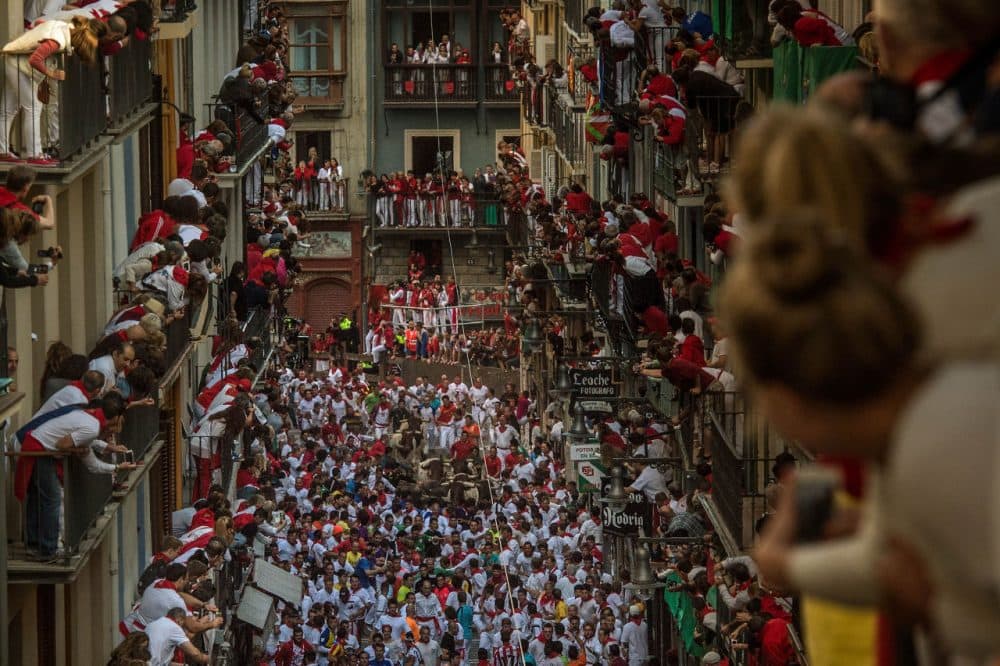 The Running Of The Bulls attracts thousands to Pamplona. (David Ramos/Getty Images)