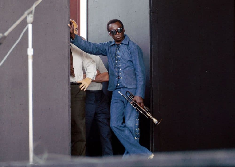 Miles Davis at Newport 1969, waiting with George Wein in the wings. (David Redfern)