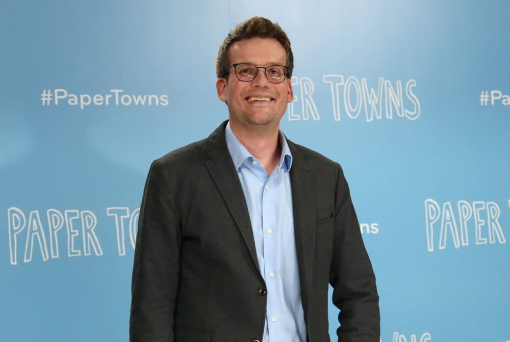 Author John Green poses for photographers at the photo call for the film Paper Towns in Claridges, central London , Thursday, 18 June, 2015. (Joel Ryan/Invision/AP)