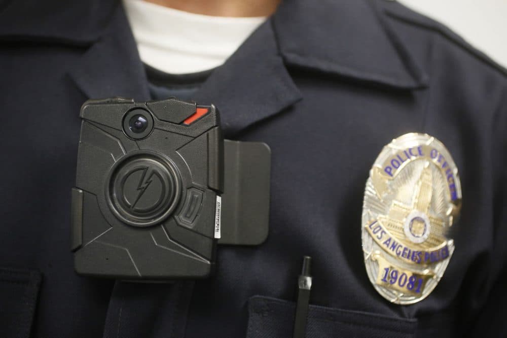 In this 2014 file photo, a Los Angeles Police officer wears an on-body camera during a demonstration for media. (Damian Dovarganes/AP)