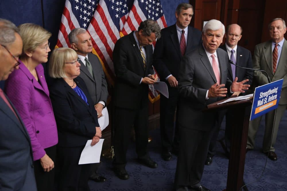 Former Sen. Chris Dodd (D-CT) (3rd R) speaks during a news conference on the fifth anniversary of the Dodd-Frank Wall Street Reform and Consumer Protection Act with (L-R) Sen. Chuck Schumer (D-NY), Sen. Elizabeth Warren (D-MA), Sen. Patty Murray (D-WA), Sen. Jack Reed (D-RI), Sen. Sherrod Brown (D-OH), Sen. Jeff Merkley (D-OR), Sen. Chris Coons (D-DE) and Sen. Richard Durbin (D-IL) at the U.S. Capitol Visitors Center July 21, 2015 in Washington, DC. (Chip Somodevilla/Getty Images)
