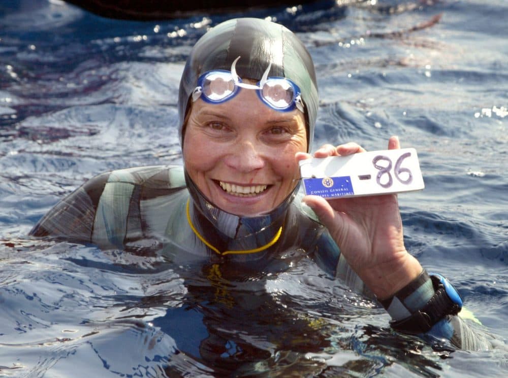 Russian Natalia Molchanova shows the minus 86 metres tag that gave her a win in the first women's free-diving world championship on September 3, 2005 in Villefranche-sur-Mer. Molchanova retained her world champion status. (Jacques Munch/AFP/Getty Images)