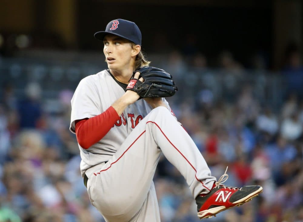 Red Sox starting pitcher Henry Owens winds up during a game against the New York Yankees, his debut in the majors, at Yankee Stadium in New York, Tuesday.  (Kathy Willens/AP)