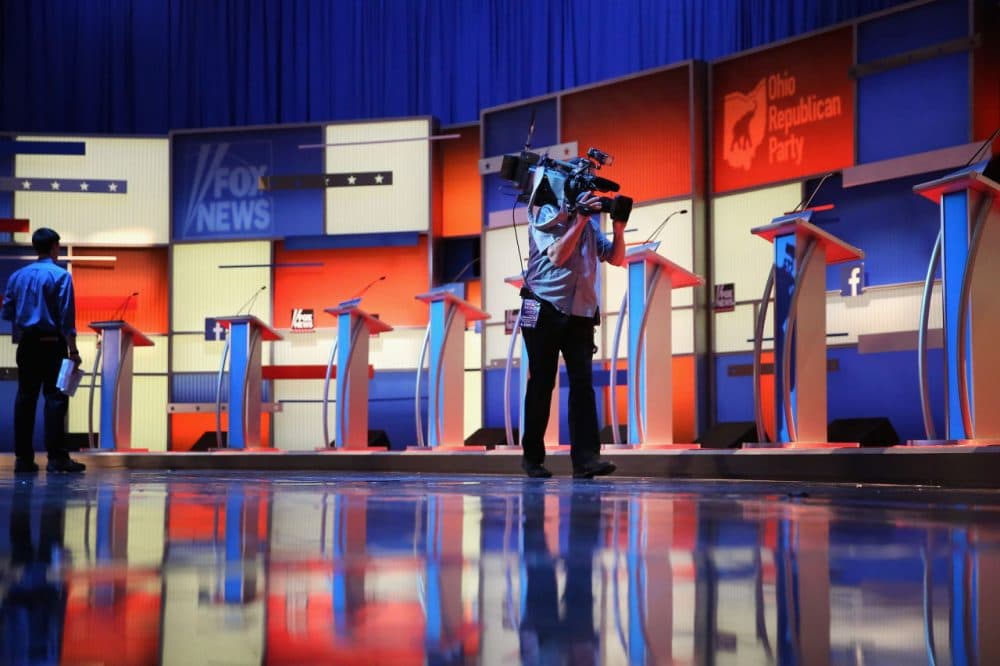 The row of ten podiums for the Republican presidential debate is set on stage at The Quicken Loans Arena August 6, 2015 in Cleveland, Ohio. (Chip Somodevilla/Getty Images)