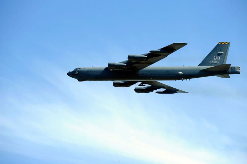 A B-52 bomber flys over the track during pre-race activities prior to the start of the Sylvania 300 at the New Hampshire Motor Speedway at New Hampshire Motor Speedway on September 25, 2011 in Loudon, New Hampshire.  (Jason Smith/Getty Images for NASCAR)