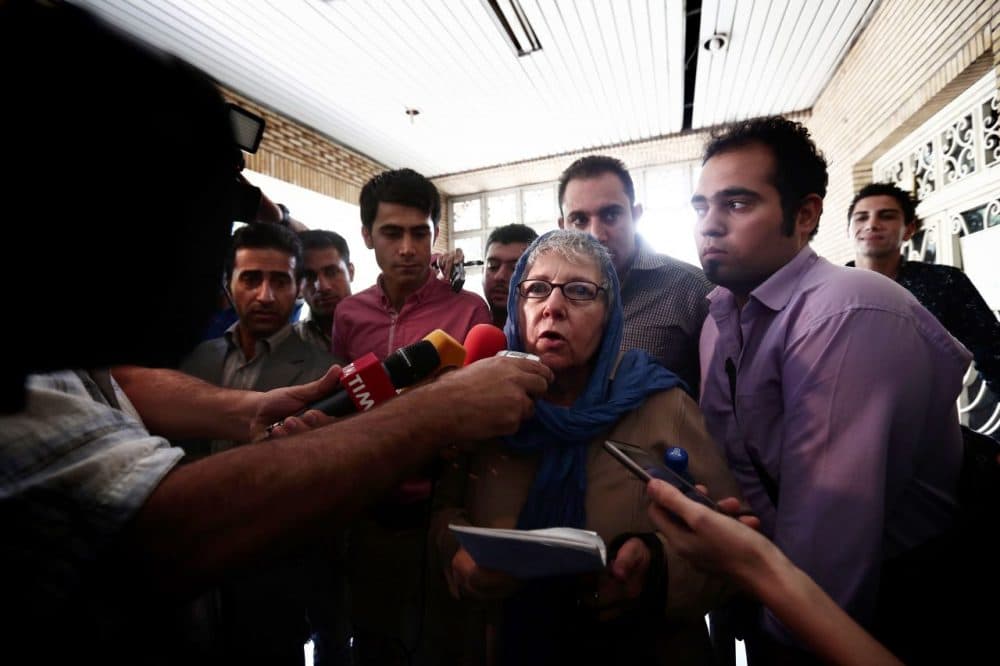 Mary Rezaian , the mother of detained Washington Post correspondent Jason Rezaian talks to journalists as she leaves the Revolutionary Court after a hearing yesterday in Tehran. The trial of 39-year-old Iranian-American journalist, Jason Rezaian who has been in custody for more than a year, resumed behind closed doors, in what could be the final hearing before a judgment is issued on whether he spied on Iran. (Behrouz Mehri/Getty Images)