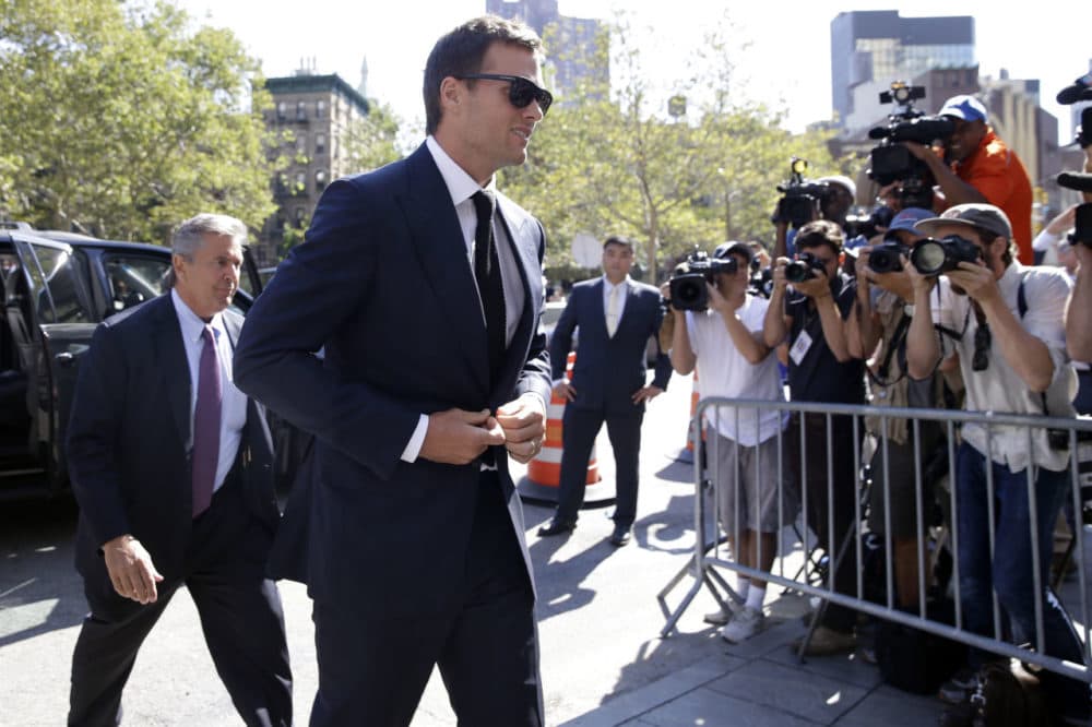 New England Patriots quarterback Tom Brady arrives at federal court, Wednesday, Aug. 12, 2015, in New York. Brady and NFL Commissioner Roger Goodell are set to explain to a judge why a controversy over underinflated footballs at last season's AFC conference championship game is spilling into a new season. (Mary Altaffer/AP)