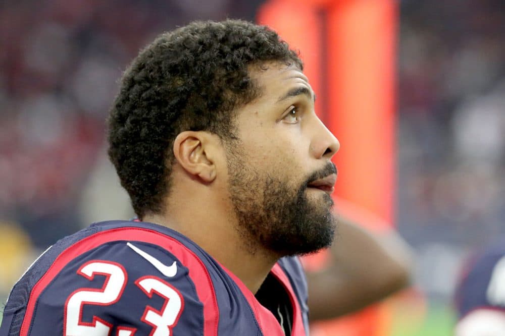 Houston Texans running back Arian Foster is being called &quot;the anti-Tim Tebow&quot; after saying he is an atheist. (Thomas B. Shea/Getty Images)