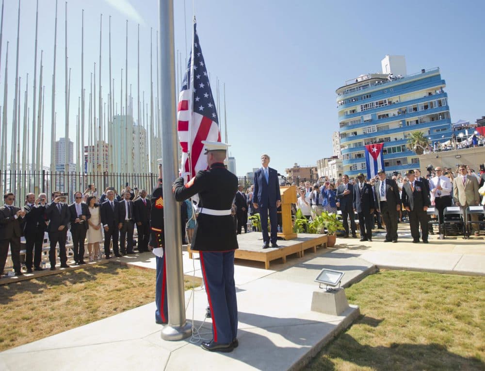 Secretary of State John Kerry, and other dignitaries watch as U.S. Marines raise the U.S. flag over the newly reopened embassy in Havana, Cuba this morning. Kerry traveled to the Cuban capital to raise the U.S. flag and formally reopen the long-closed U.S. Embassy. Cuba and U.S. officially restored diplomatic relations July 20, as part of efforts to normalize ties between the former Cold War foes. (Martinez Monsivais/AP)
